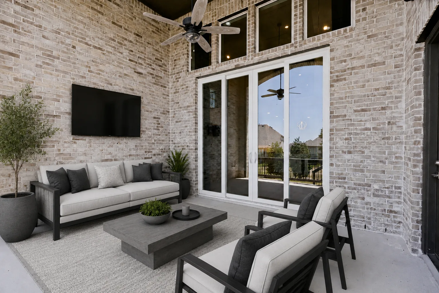 Covered patio with motorized screen